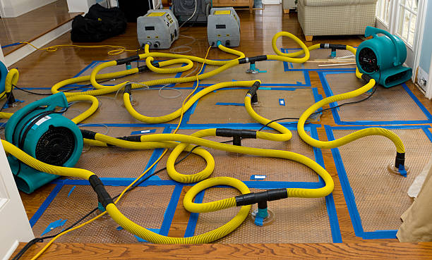 Professional Crawl Space Water Removal technician working in Fargo, ND